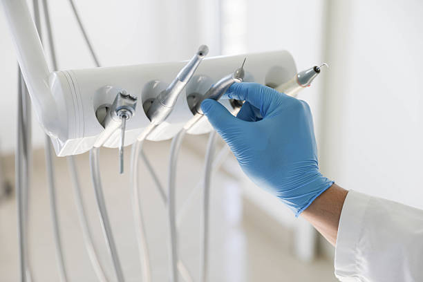 Professional Emergency Dentist technician working in Helena, OK